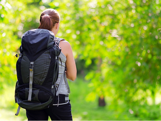 How do I clean my travel backpack